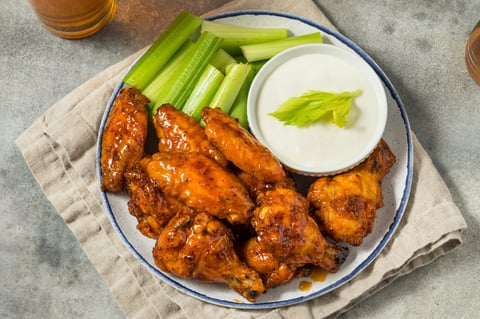 Buffalo BBQ chicken wings with beer and ranch dressing