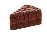 Isolated slice of rich chocolate cake with drizzled ganache